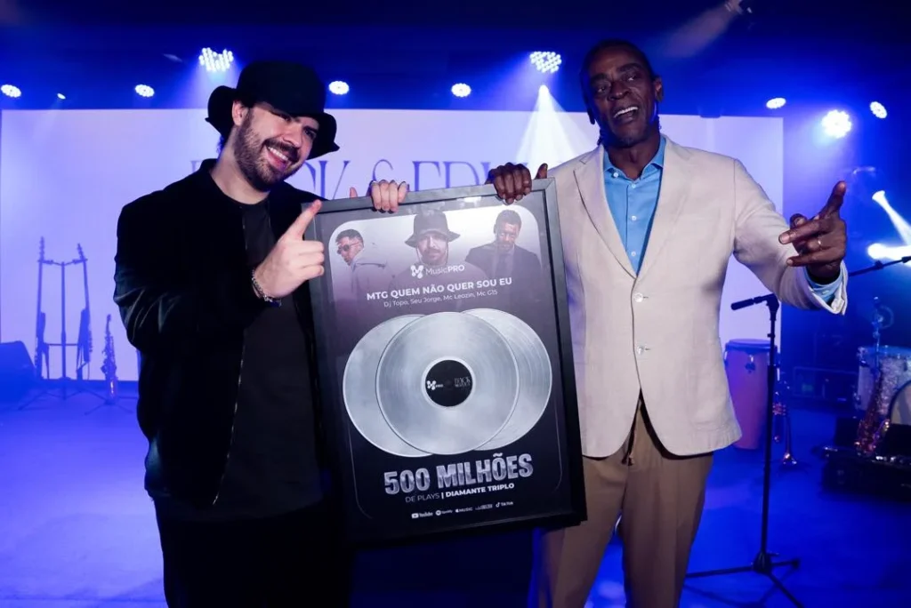 Diamante triplo: 'MTG Quem Não Quer Sou Eu' alcança 500 milhões de plays 1 O paulista DJ Topo e o carioca Seu Jorge: hitmakers em cima da estética do funk de Belo Horizonte